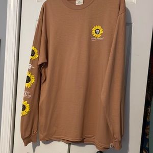 Brown simply southern with a cow and sunflowers